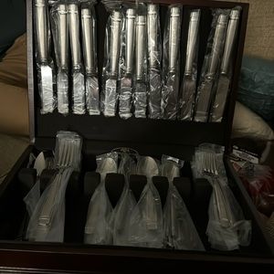 New 74 piece silverware set
